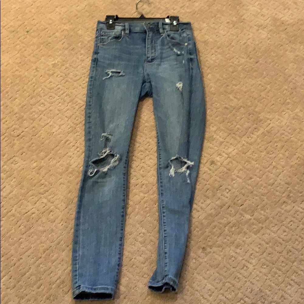 high waist dark wash ripped jeans